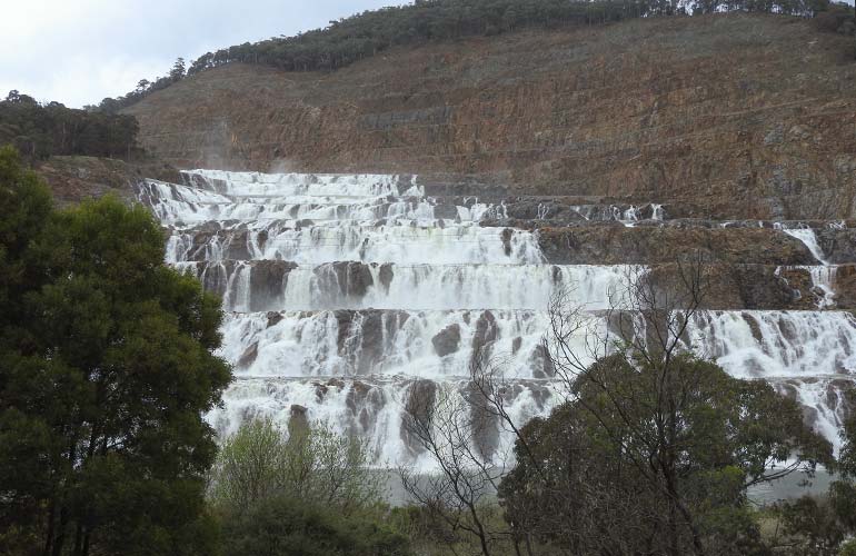 Water cascading down Dartmouth Dam's rock step spillway into the Mitta Mitta River 