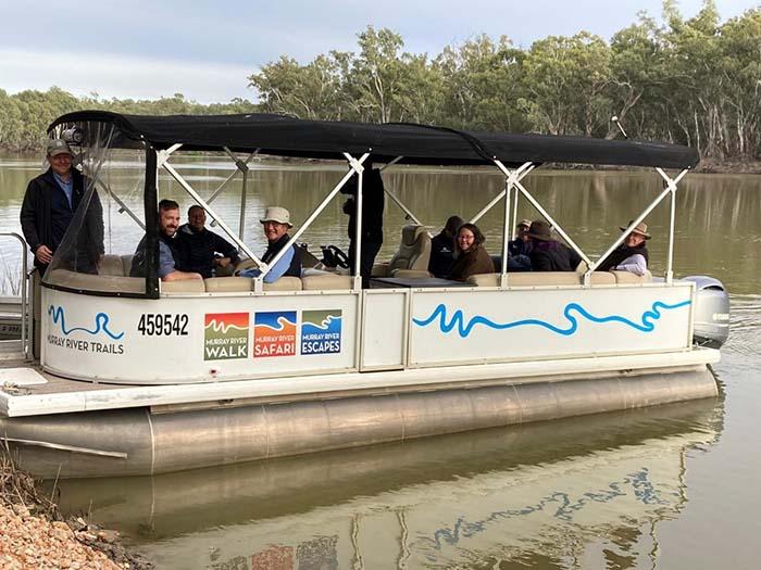 The delegation viewed the river by boat while discussing importance of river tourism.
