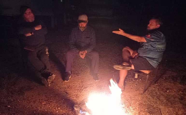 Rene Woods yarning around the campfire on Murrawarri Country.