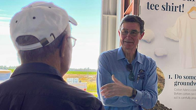 Sir Angus Houston speaking with Sam Coulton, a farmer at Boggabilla in far northern New South Wales.
